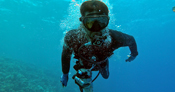 man scuba diving