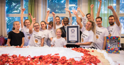 Largest vegan cake next to adjudicator