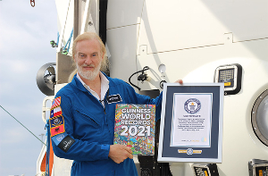 Victor vescovo holding gwr book and certificate