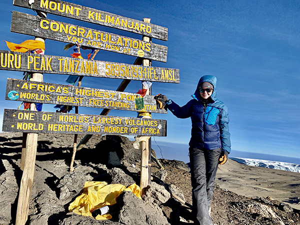Viridiana on the top of Mount Kilimanjaro in Tanzania